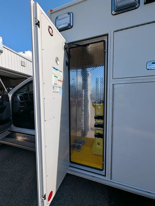 Drivers side front exterior Cabinet on a Demers MXP170E