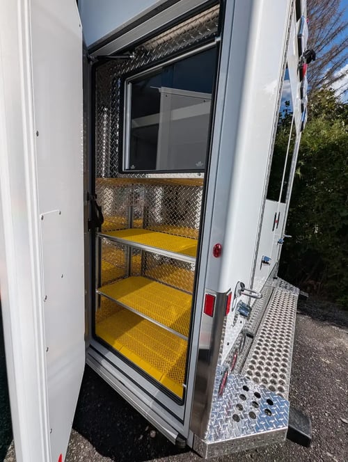 Rear driver side exterior cabinet door on MXP170E
