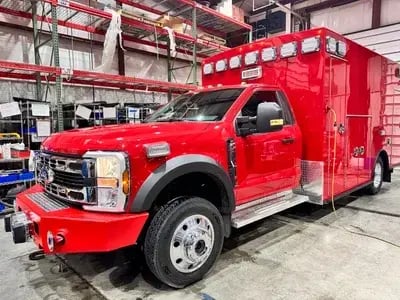 Ambulance remounted onto a new Ford chassis to restore vehicle performance and extend operational service life.