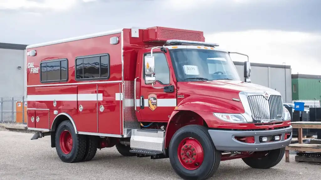 Front-left view of a BME Crew Carrier Sequoia, showcasing the crew cab, emergency response body, equipment storage compartments, and rugged firefighting vehicle design.