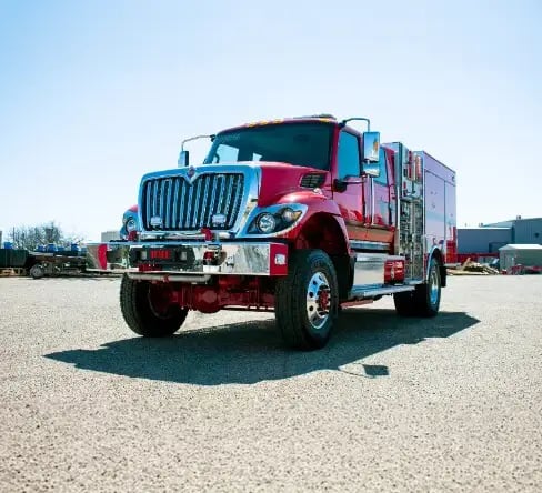 BME wildland truck with a crew cab, utility body, off-road tires, and exterior equipment compartments.