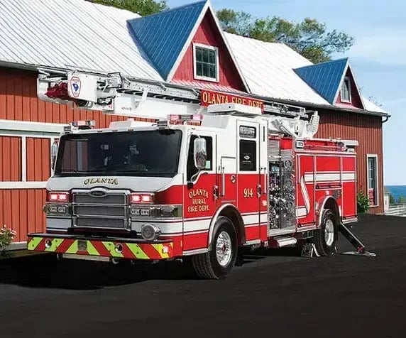 Pierce Sky-Boom apparatus with a boom-mounted platform attached to a fire truck chassis.