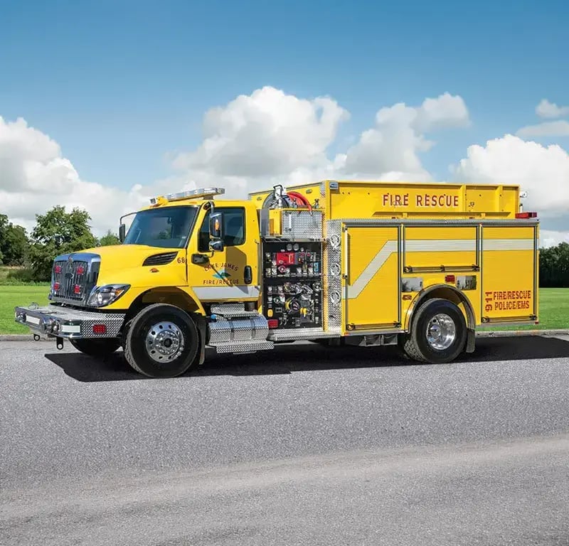 Pierce fire apparatus built on an International commercial chassis with a crew cab and exterior equipment compartments.