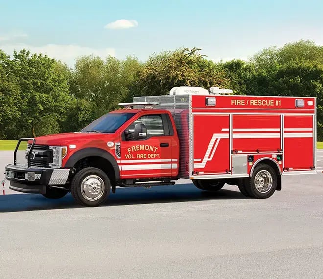 Pierce fire apparatus built on a Ford commercial chassis with a crew cab and exterior equipment compartments.