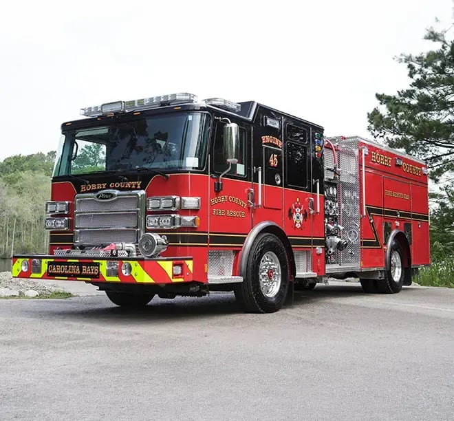Pierce Enforcer fire engine featuring a custom chassis, crew cab, pump panel, and firefighting equipment storage.