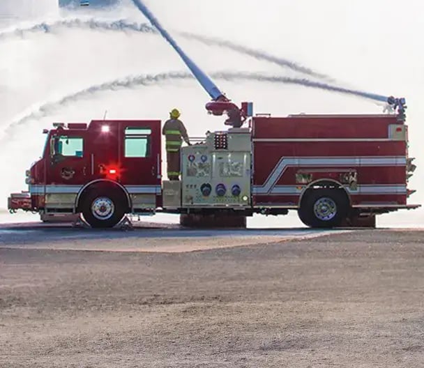 Pierce high-flow industrial pumper with a large pump system, equipment compartments, and an industrial fire apparatus body.