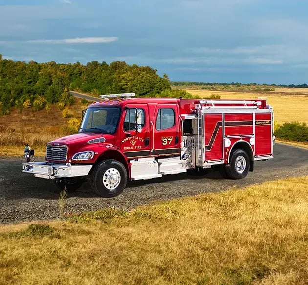 Pierce pumper responder with a crew cab, pump panel, equipment compartments, and emergency warning lights.