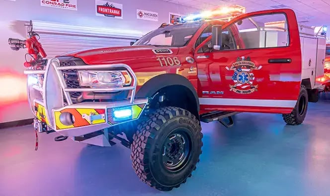 Skeeter brush truck rescue vehicle equipped with rescue gear, equipment storage, and off-road emergency response capabilities.