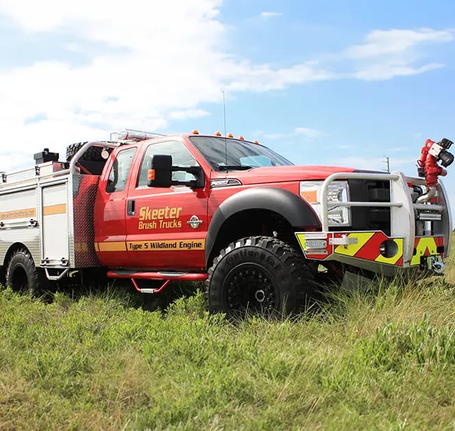 Skeeter brush truck rescue vehicle equipped with rescue gear, equipment storage, and off-road emergency response capabilities.