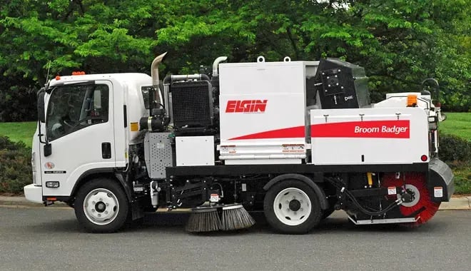Elgin Broom Badger mechanical street sweeper designed for municipal street cleaning and efficient debris collection.