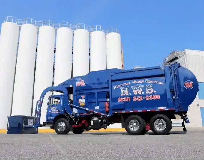 Heavy-duty front-loader garbage truck used for commercial waste collection, recycling services, and industrial sanitation operations.