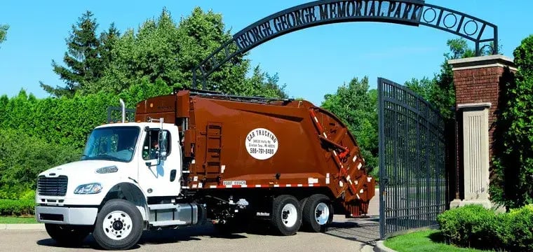 Municipal Garbage Truck Entering George Memorial Park