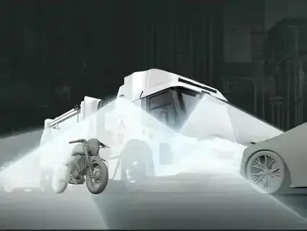 Electric refuse truck equipped with 360-degree visibility, pedestrian detection, and advanced safety technology to improve awareness during urban waste collection operations.