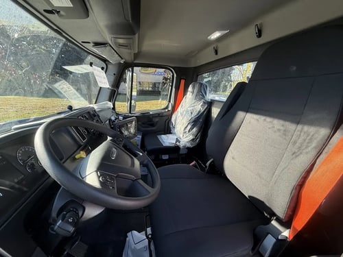 Driver side interior of a in-stock vactor 2100i