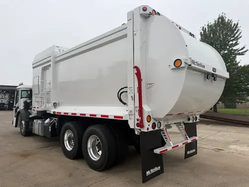 Rear side angle of a 2027 McNeilus ZR for sale from MacQueen