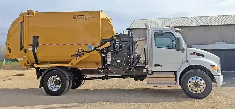 Titan Olympian 2 chassis-mounted leaf vacuum engineered for high-volume leaf collection, municipal debris removal, and efficient seasonal cleanup operations.