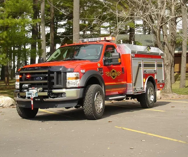 EJ Metals Quick Attack fire apparatus with a compact body, hose storage, and equipment compartments for rapid deployment.