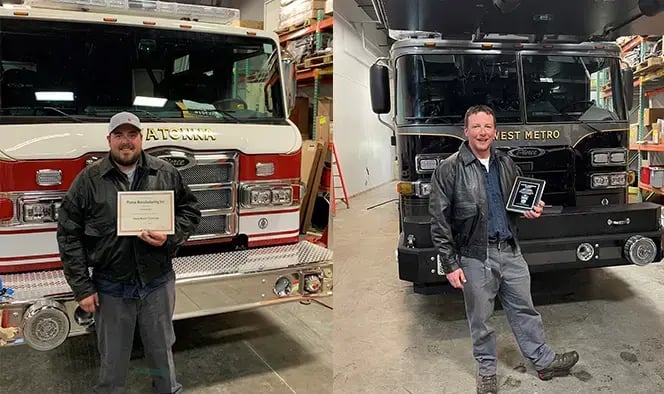 Emergency vehicle technicians recognized for service excellence while standing in front of Pierce fire apparatus inside a service facility.