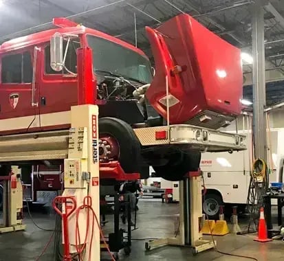 Ambulance remount service extending vehicle life by installing an existing patient module on a new chassis.