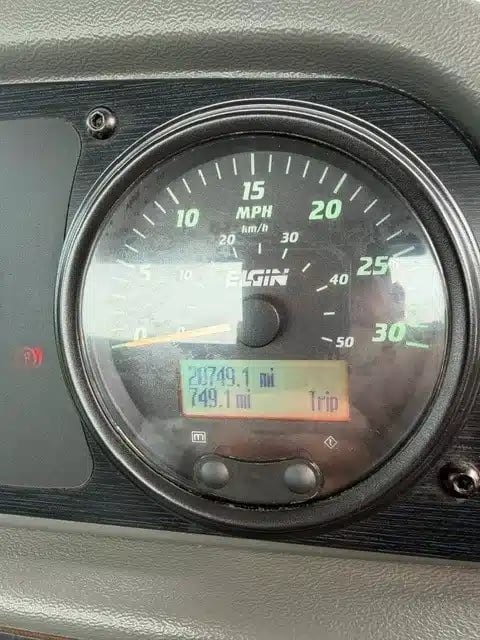 Odometer displaying 20,749.1 miles on a 2018 Elgin Pelican NP street sweeper