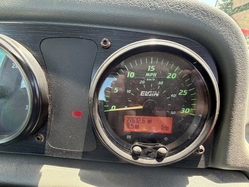 Odometer showing 27,632.6 miles on a 2015 Elgin Pelican NP