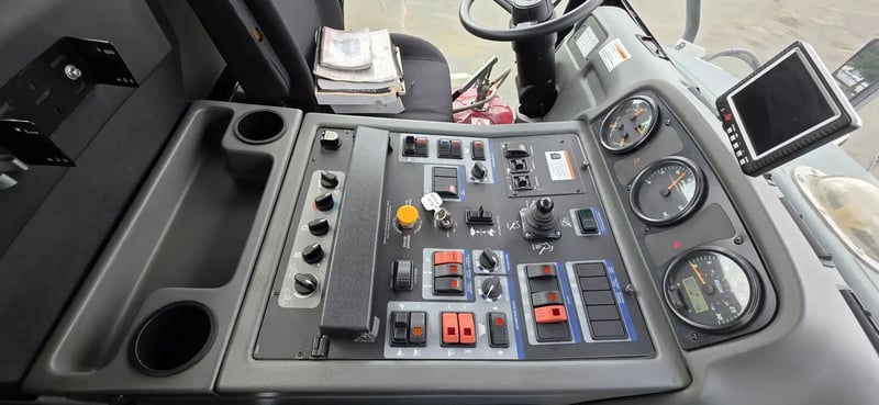Operator control panel inside a 2015 Elgin Pelican NP Dual street sweeper.