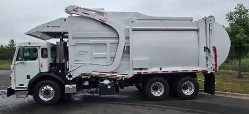 2026 McNeilus Atlantic Commercial 40 yard front loader refuse truck driver side profile