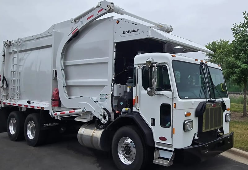 2026 McNeilus Atlantic Commercial 40 yard front loader garbage truck front passenger side view