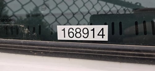 Fleet unit number 168914 displayed on 2026 McNeilus Atlantic Commercial front loader truck