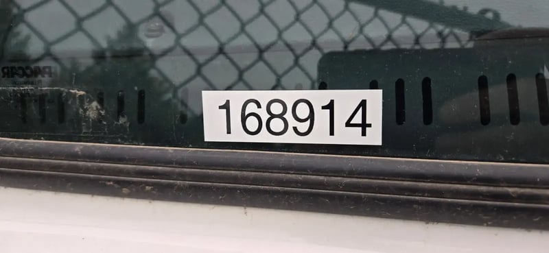 Fleet unit number 168914 displayed on 2026 McNeilus Atlantic Commercial front loader truck