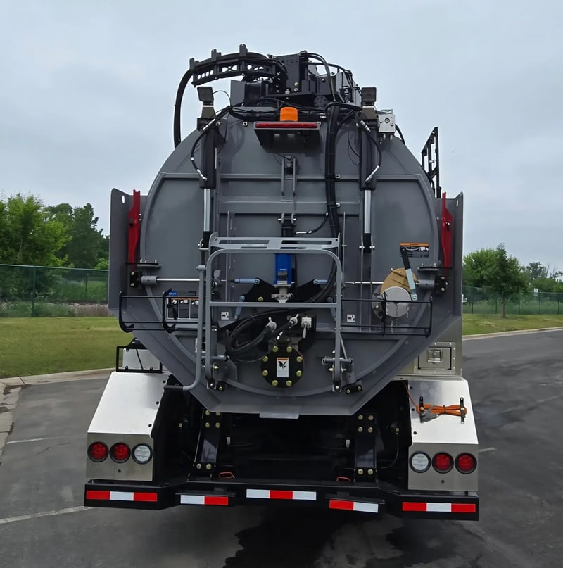 Rear view of 2026 TRUVAC HXX hydro excavation truck debris tank and rear door assembly