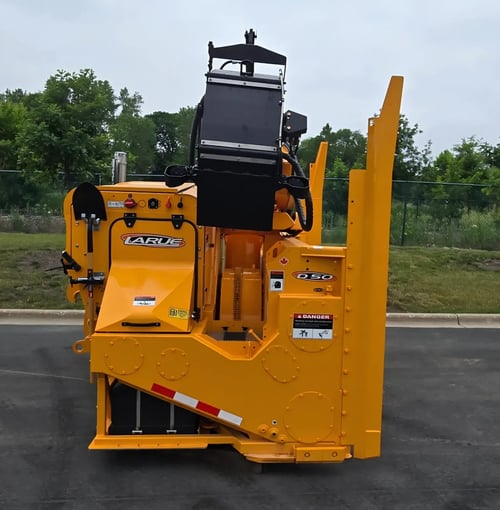 Larue D50 loader-mounted snow blower side profile showing engine compartment