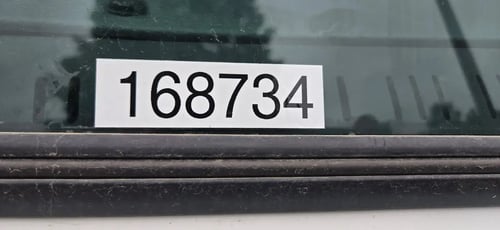 Unit identification number displayed on a McNeilus Atlantic 40-yard front loader truck.