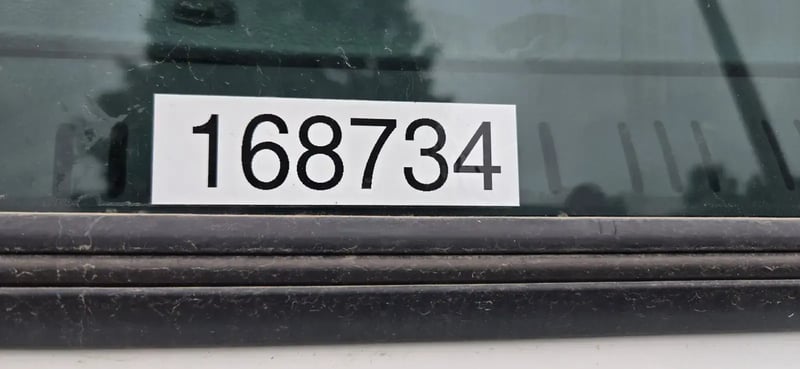 Unit identification number displayed on a McNeilus Atlantic 40-yard front loader truck.