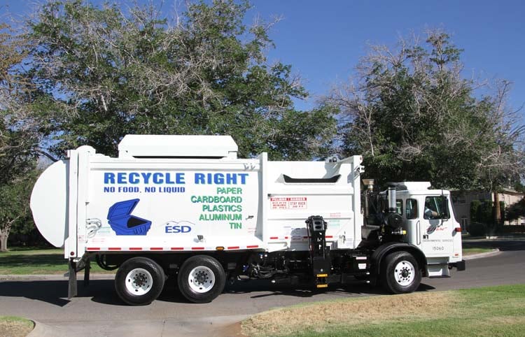 McNeilus Auto Reach Side Loader 1