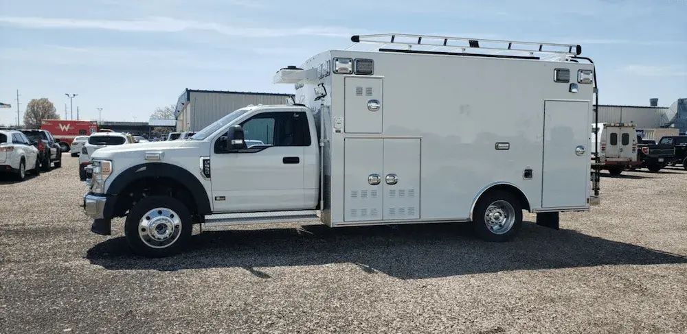 Braun Express Plus Type I ambulance with a truck-mounted patient care module designed for emergency medical transport and EMS response.