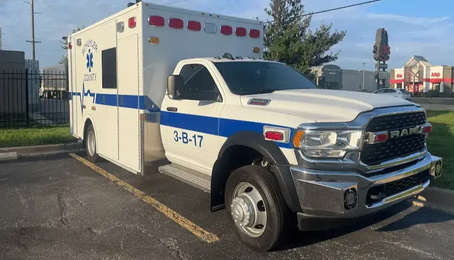 Demers MXP170 ambulance featuring a modular patient care compartment, emergency lighting, and a truck-based chassis for medical transport and emergency response.