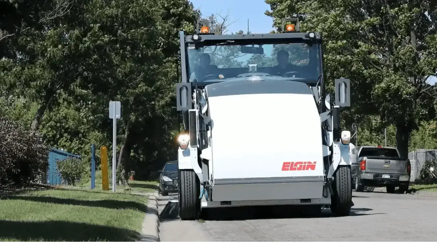 Elgin pelican sweeping municipal street during demonstration