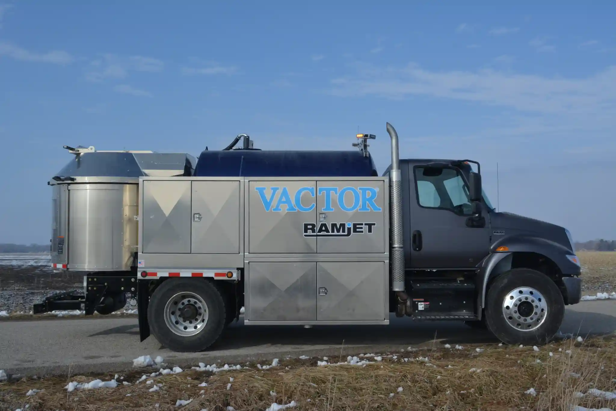 Vactor Ramjet truck-mounted jetter, featuring an integrated water system, hose reel, and high-pressure cleaning capabilities for sewer and pipeline maintenance.