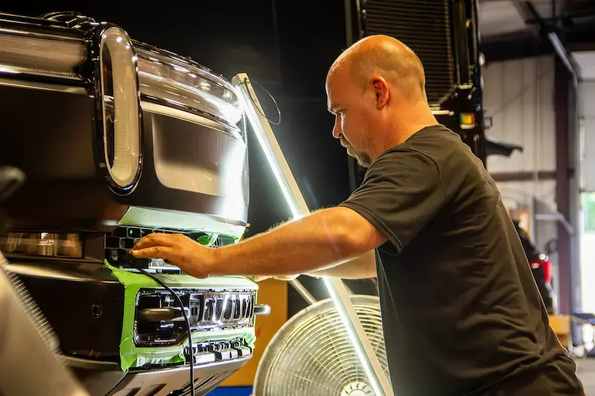 Rivian specialty vehicle with custom upfitting for fleet operations, emergency response, and utility applications.